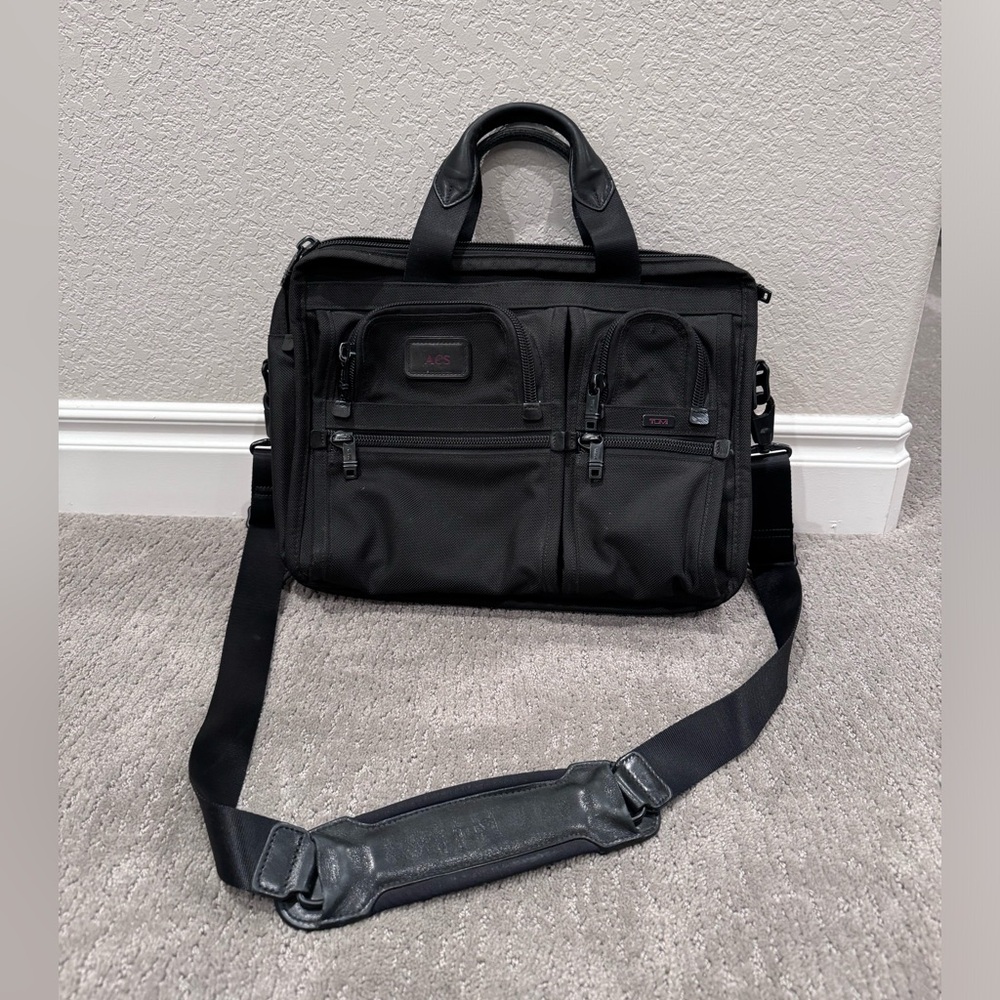 Tumi Alpha Expandable Briefcase with laptop padded removable sleeve.